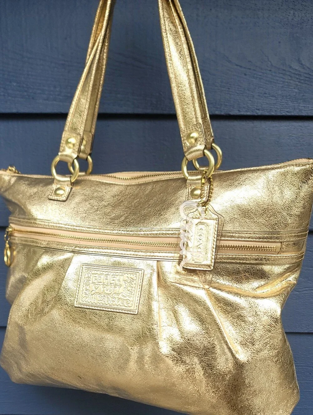 Coach Poppy Metallic Gold Leather Tote With Cursive Coach Charm